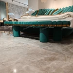 Green Wave-Shaped Velvet Bed Bench with Gold Stainless Steel Trim